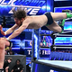 Daniel Bryan dives onto A.J. Styles in their match at Tuesday’s SmackDown taping in Atlanta, which was moved from this Friday’s Crown Jewel event in Saudi Arabia.